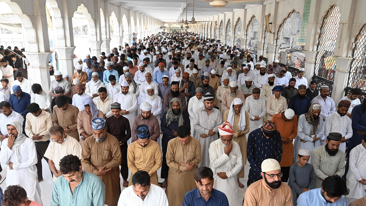 Muslim devotees offer the last Friday prayers of the holy fasting month of Ramadan at the Data Darbar mosque in Lahore on April 29. Credit: AFP Photo
