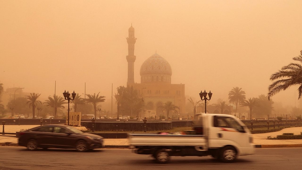 In Pics | Baghdad chokes under blanket of dust as sandstorms sweep Iraq
