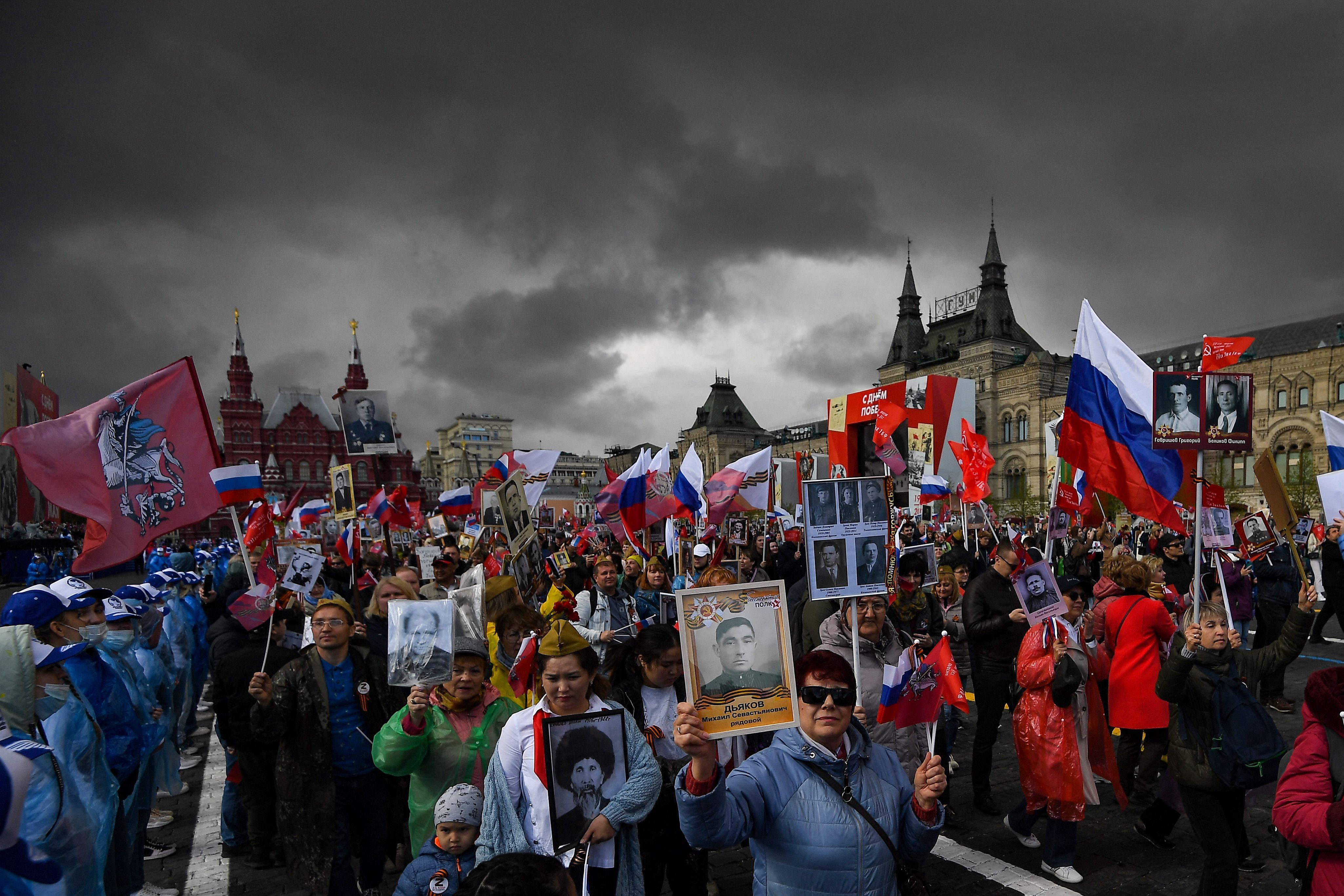 People take part in the Immortal Regiment march on Red Square in central Moscow. Credit: AFP Photo