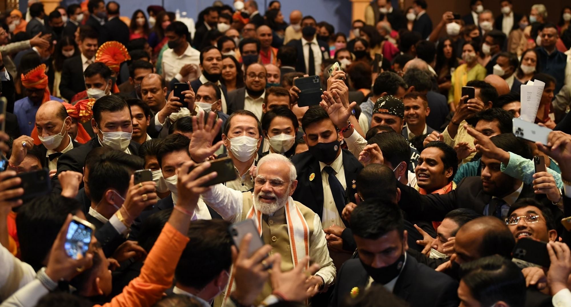  Prime Minister Narendra Modi interacts with members of the Indian community during an event, in Tokyo. Credit: PTI Photo