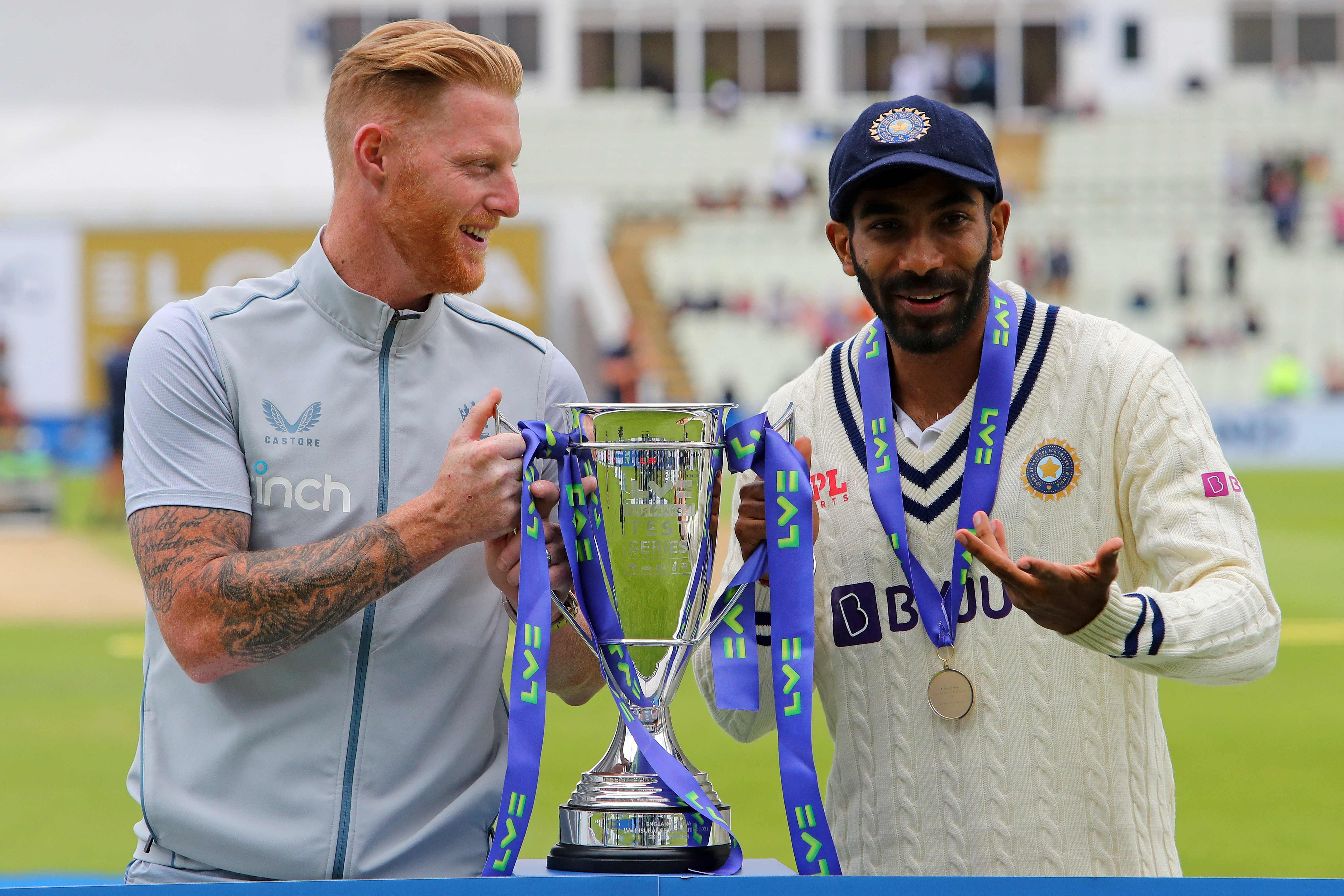 England's captain Ben Stokes (L) and India's Jasprit Bumrah (R) pose with the LV trophy after England won on Day 5 of the fifth cricket Test match between England and India at Edgbaston, Birmingham. Credit: AFP Photo