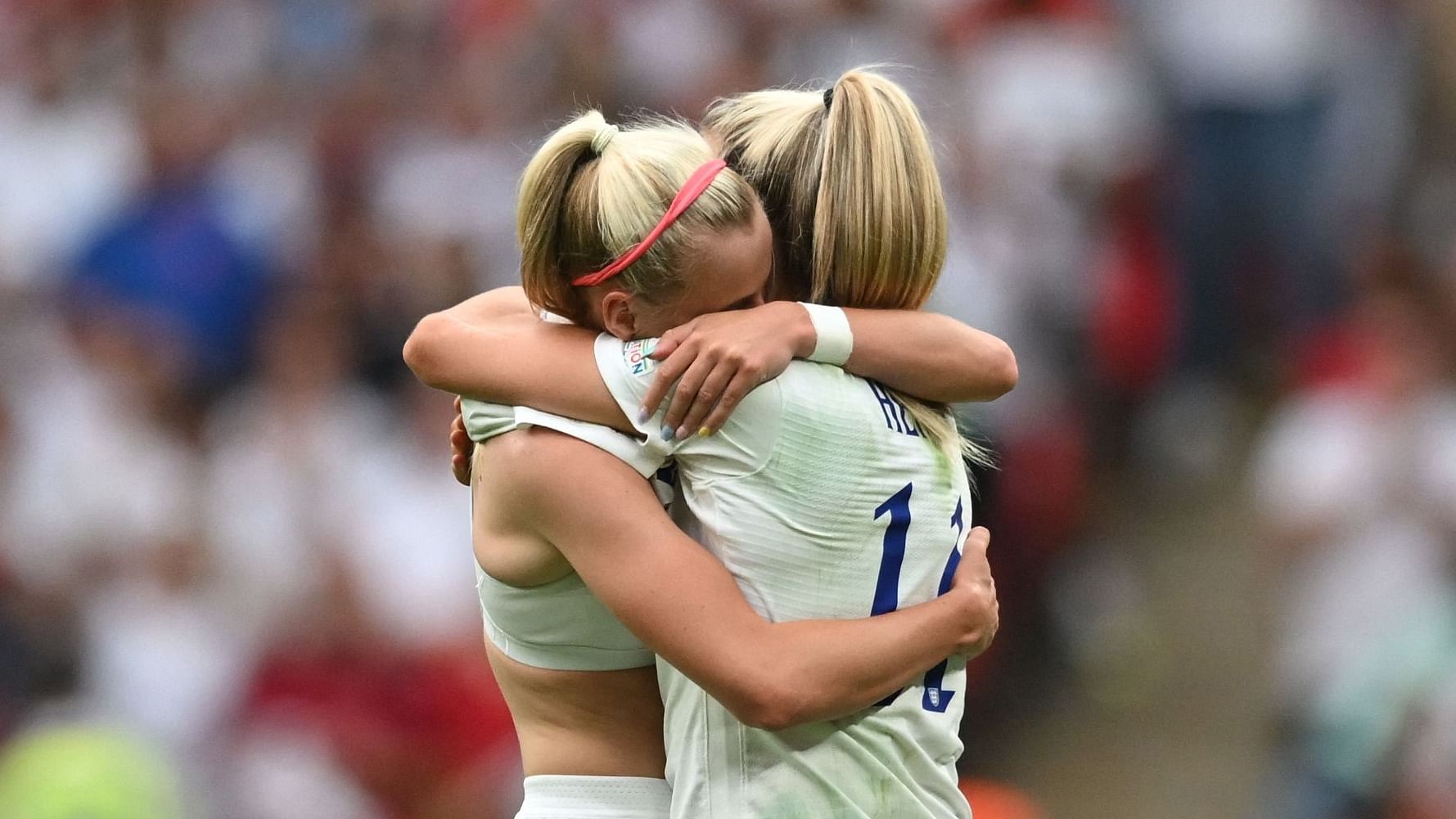 England's striker Chloe Kelly celebrates after scoring her team second goal during the UEFA Women's Euro 2022 final football match between England and Germany at the Wembley stadium, in London. Credit: AFP Photo