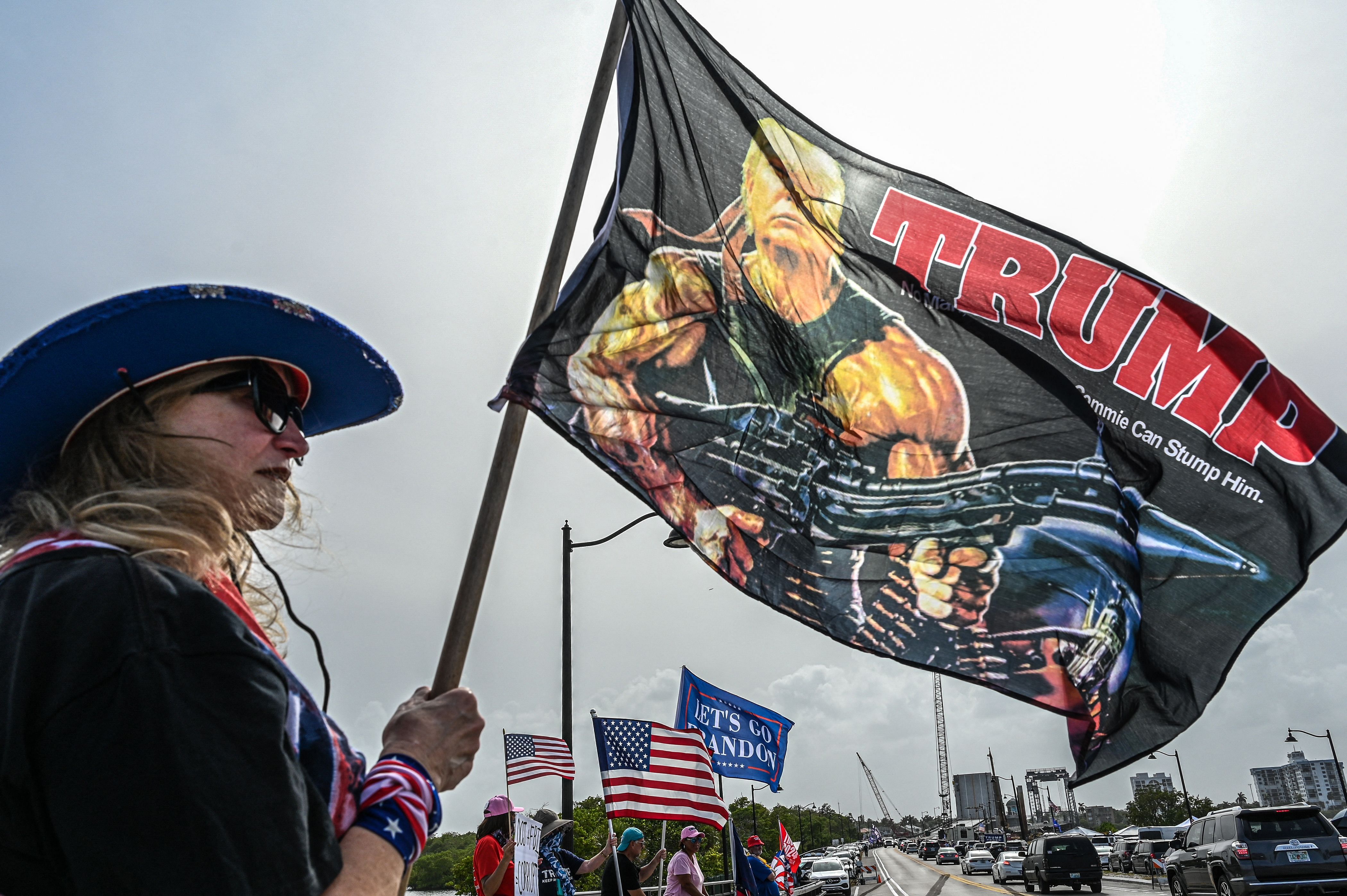Supporters of former US President Donald Trump gather near his residence at Mar-A-Lago in Palm Beach, Florida. Credit: AFP Photo
