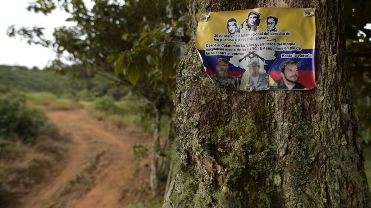 Picture of a placard of the Revolutionary Armed Forces of Colombia (FARC) dissident guerrilla in Catatumbo, Norte de Santander Department, Colombia. Credit: AFP Photo