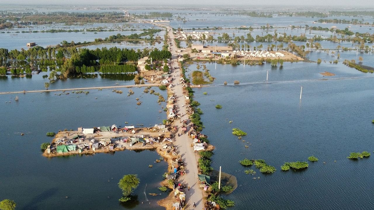  This aerial photograph shows makeshift tents for people displaced due to the floods after heavy monsoon rains at Sohbatpur in Jaffarabad district of Balochistan province. Credit: AFP Photo