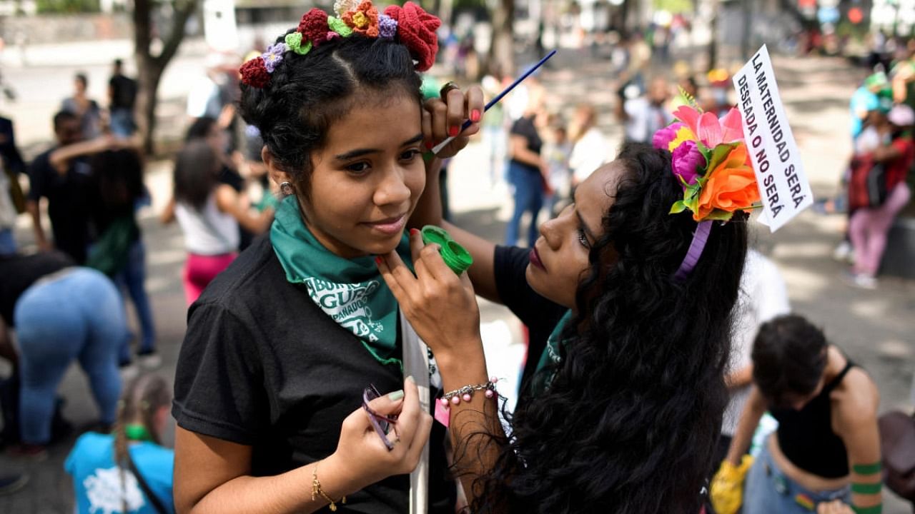 Feminist collectives and abortion rights campaigners take part in a protest to mark the International Safe Abortion Day, in Caracas. Credit: Reuters photo