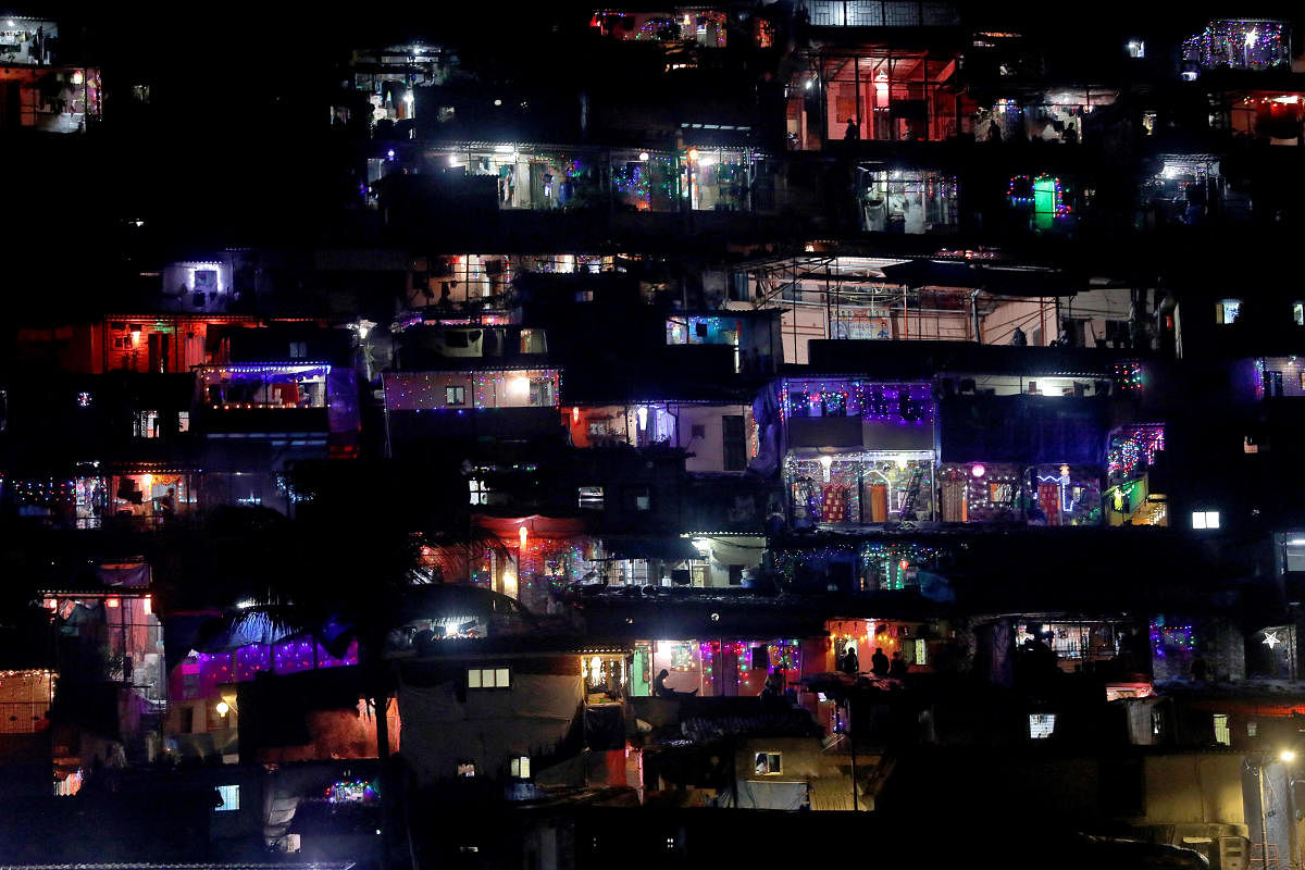 Houses are lit up with decorative lights and lanterns on the occasion of Diwali, the Hindu festival of lights, at a slum in Mumbai. Credit: Reuters Photo
