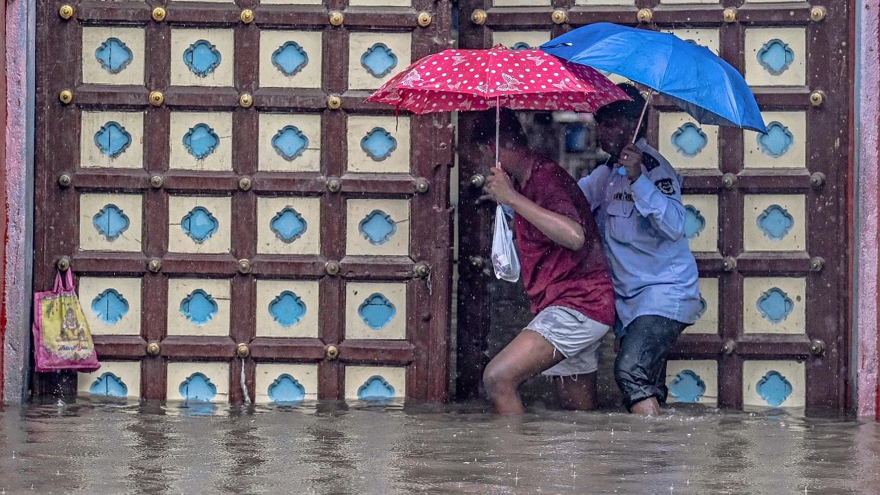 Schools shut, streets flooded as heavy rains paralyse Chennai again