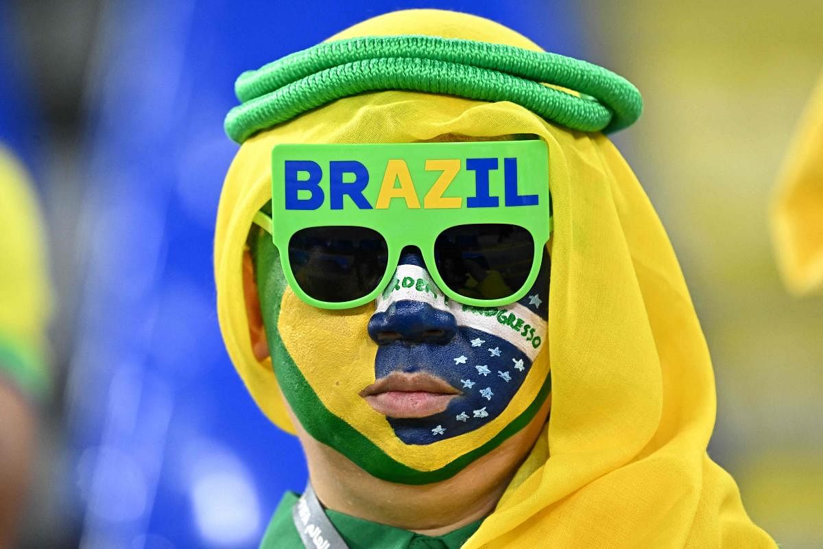 A Brazil supporter at the Qatar 2022 World Cup round of 16 football match between Brazil and South Korea. Credit: AFP Photo