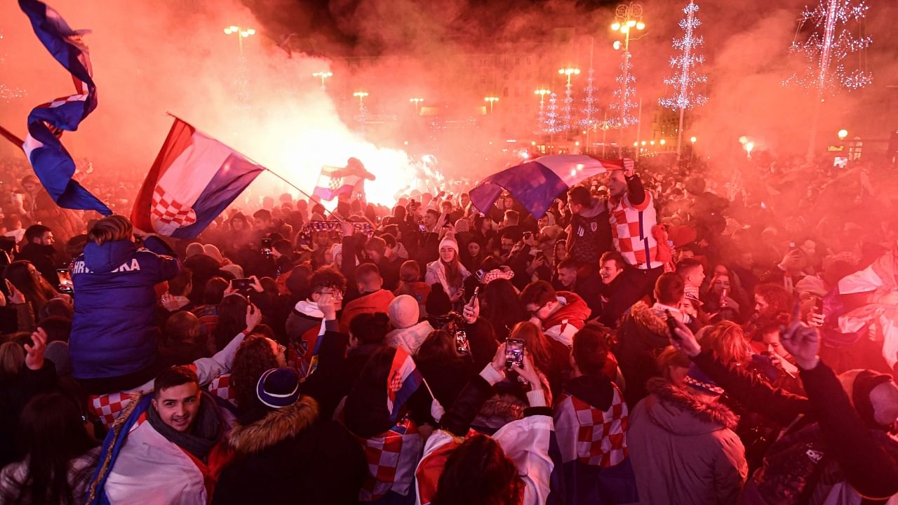 Croatian supporters celebrate after the victory at the end of the Qatar 2022 World Cup football third-placed match between Croatia and Morocco, in Zagreb, on December 17, 2022. Credit: AFP Photo