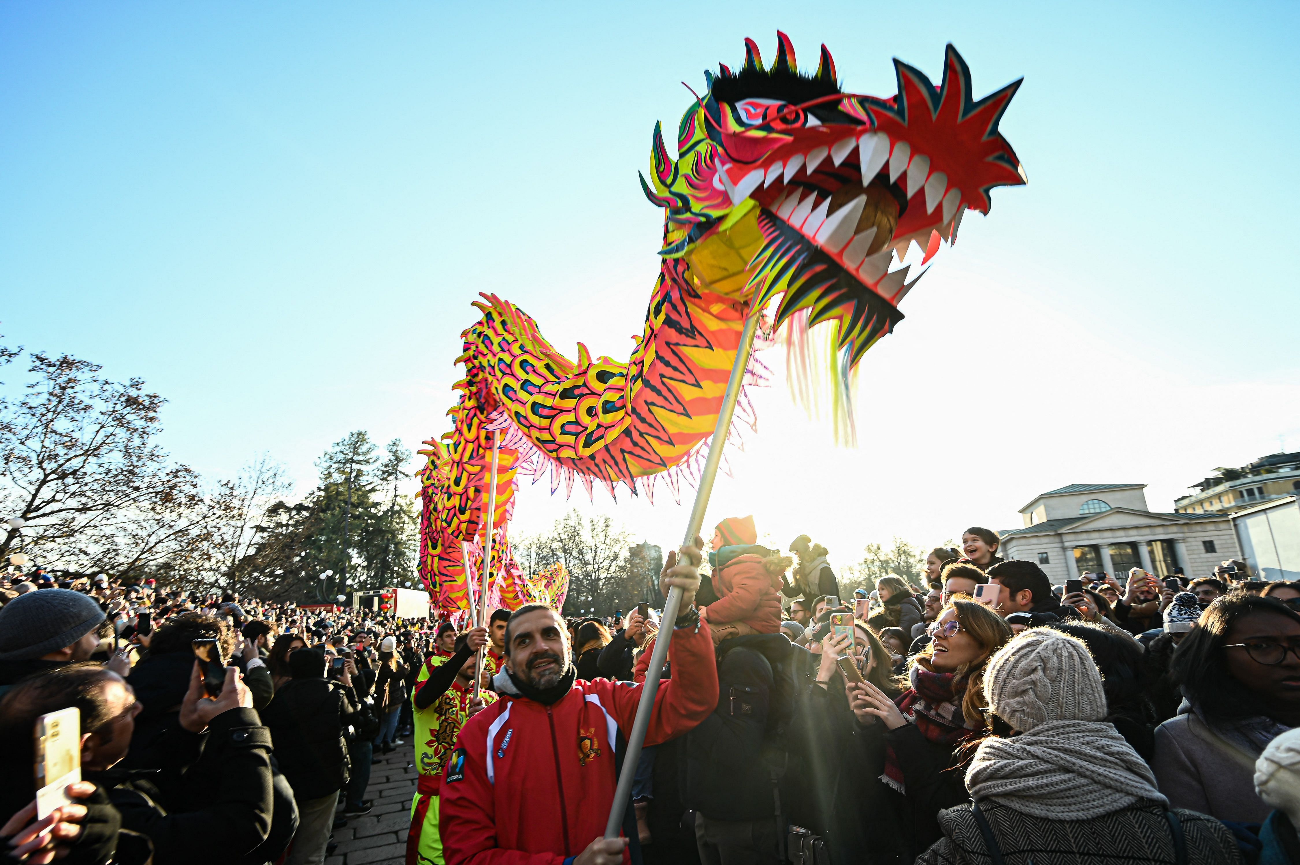 Performers take part in a parade celebrating the Chinese Lunar New Year of the Rabbit, in central Milan, Italy. Credit: AFP Photo