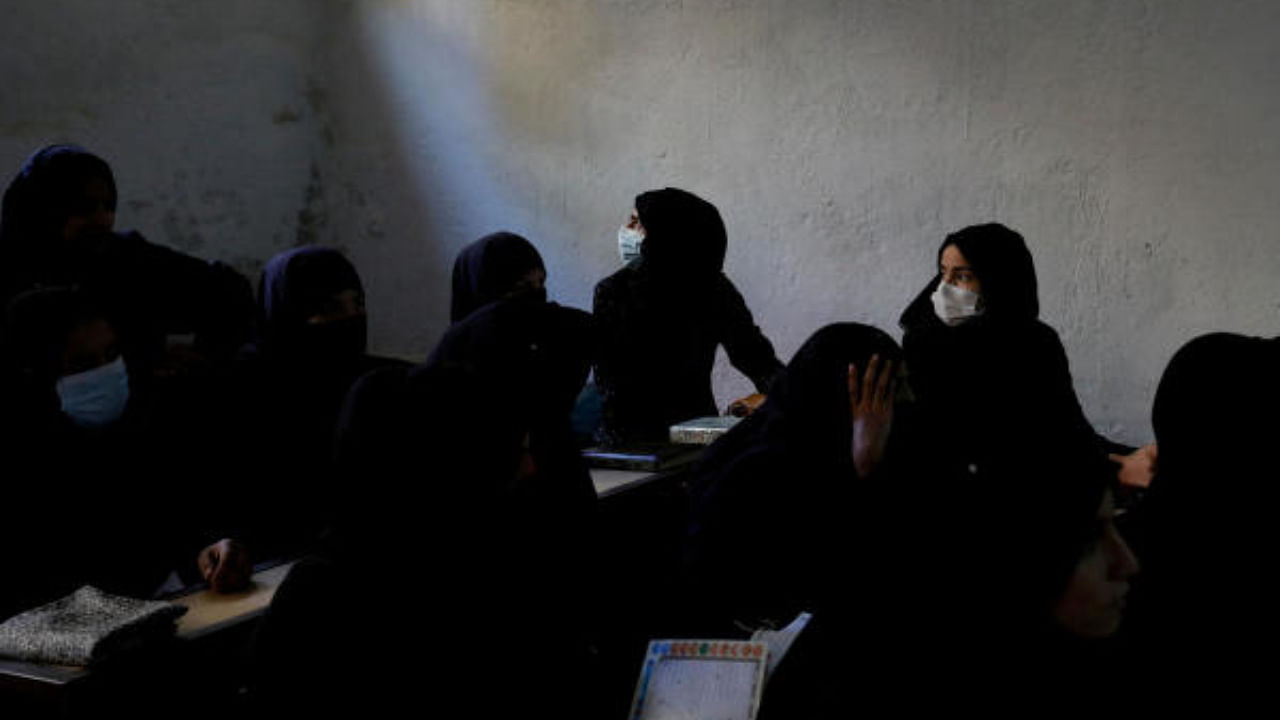 Afghan women learn how to read the Koran in a madrasa or religious school in Kabul. Credit: Reuters Photo