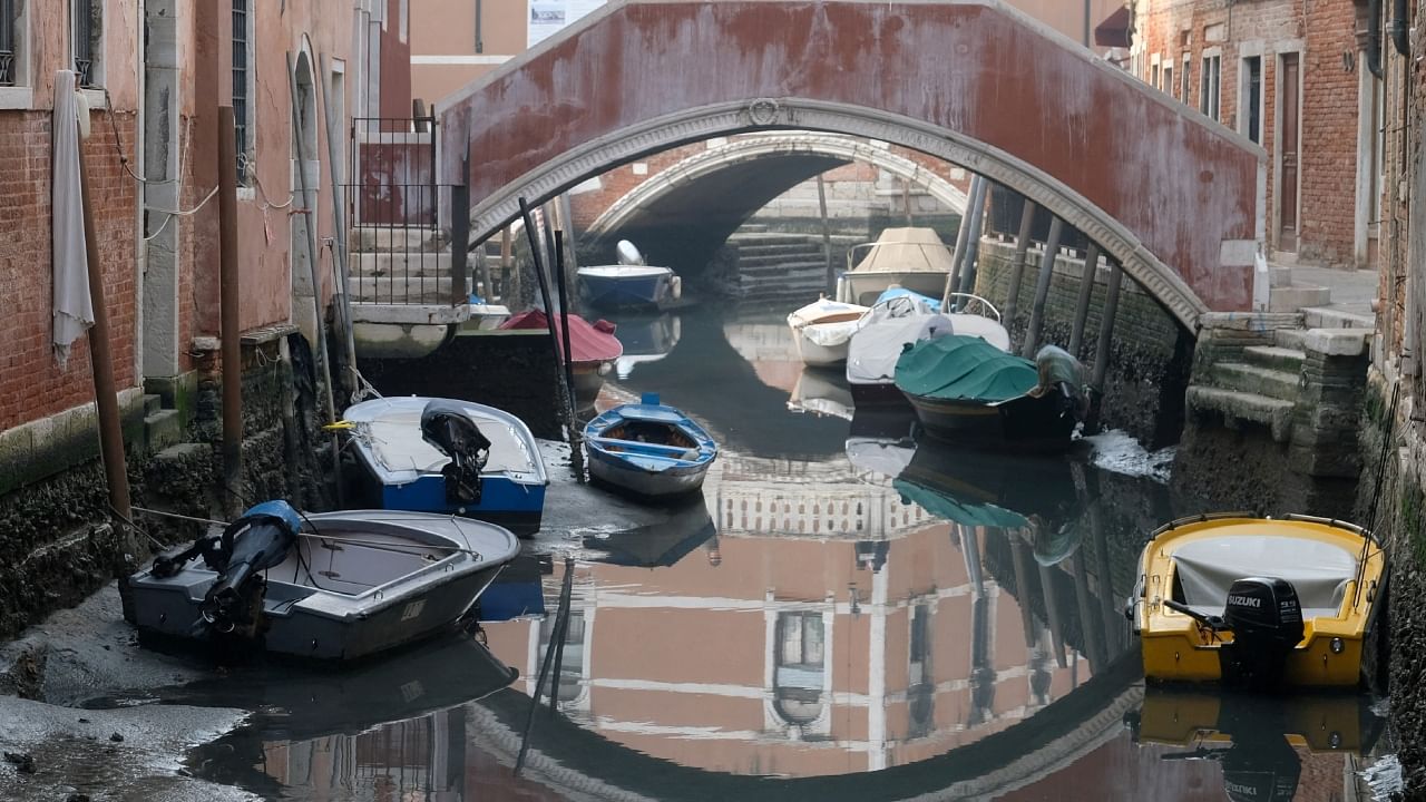 In Pics | Canals in Venice dry up as Italy faces drought threat Credit: Reuters Photo