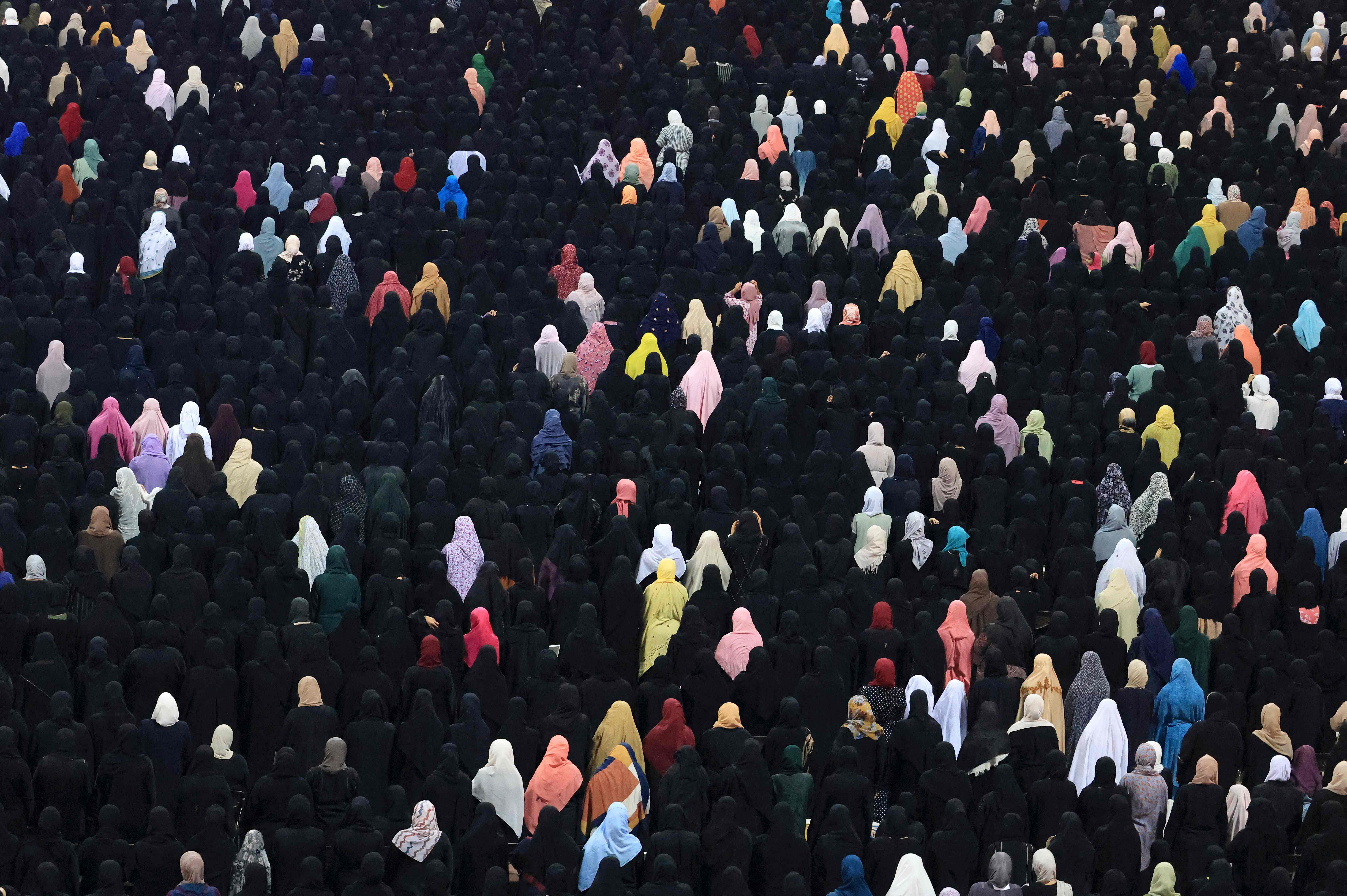 Muslim women pray at the Sheikh Zayed Grand Mosque in Abu Dhabi. Credit: AFP Photo