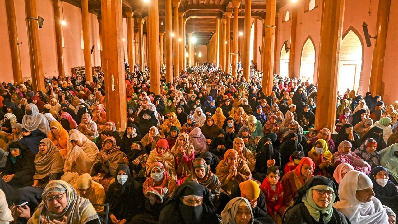 Muslim devotees offer last Friday prayers of the holy fasting month of Ramadan at the Jamia Masjid in Srinagar. Credit: AFP Photo