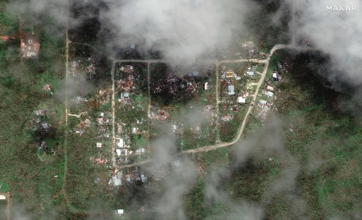 A satellite image shows damaged homes and neighborhoods after typhoon Mawar. Credit: Reuters Photo