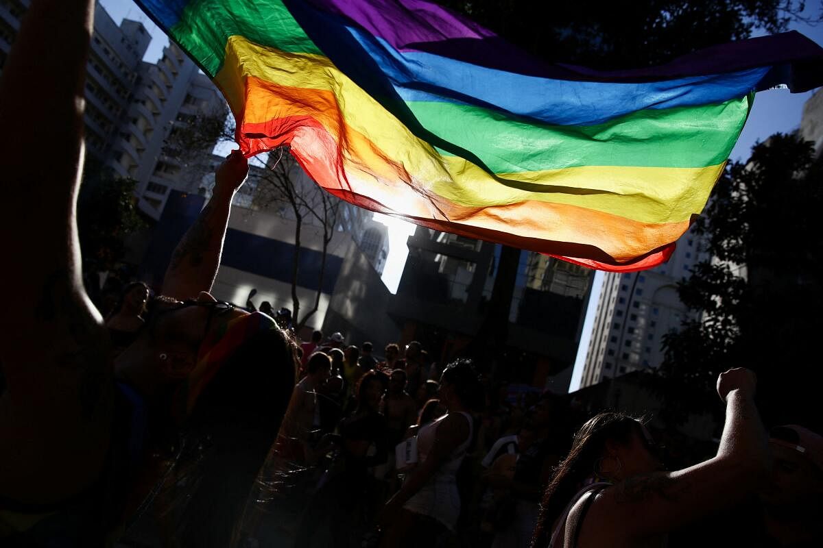People attend a march through Paulista Avenue to celebrate LGBTQ+ rights during the annual pride parade, in Sao Paulo, Brazil. Credit: Reuters Photo