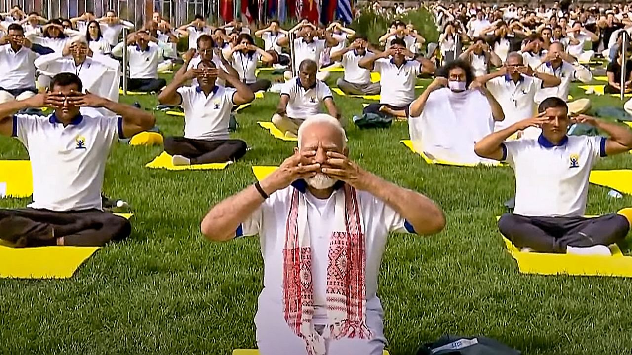 Prime Minister Narendra Modi described Yoga as "truly universal" and "free from copyrights and patents" as he led a historic event at the UN headquarters to commemorate the 9th International Day of Yoga, attended by top UN officials, diplomats and prominent personalities. Credit: Reuters Photo