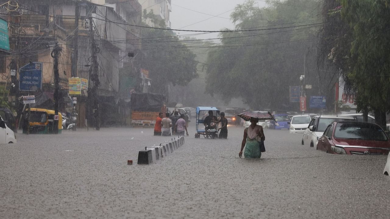 Delhi Rains: Heavy downpour disturb daily life in the capital. Credit: Reuters Photo