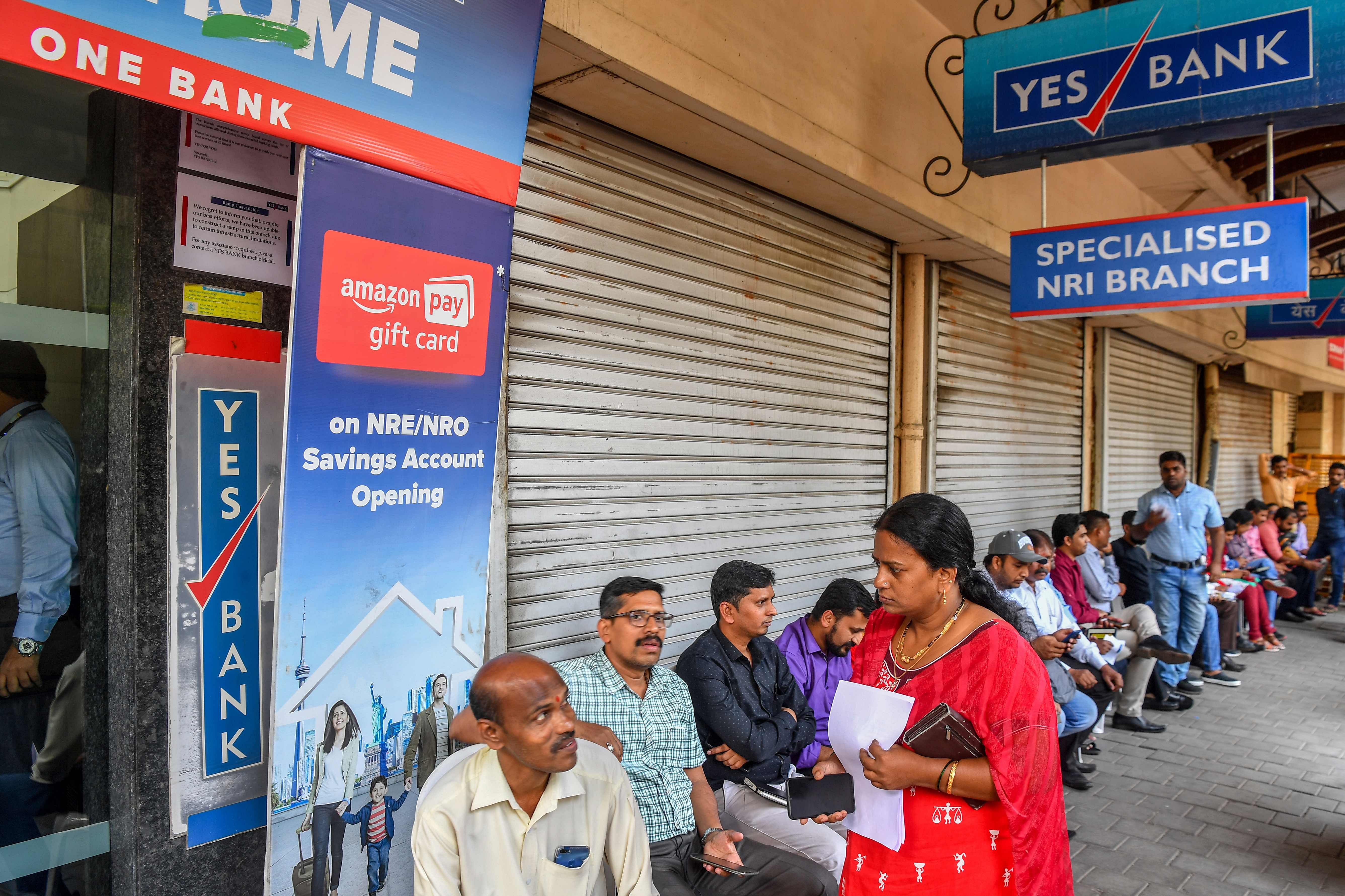 Customers Rush To ATMs After RBI Caps Withdrawal Limit